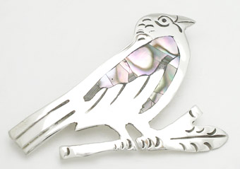 Bird brooch with concha
