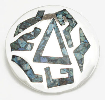 Brooch with figuras of resin green