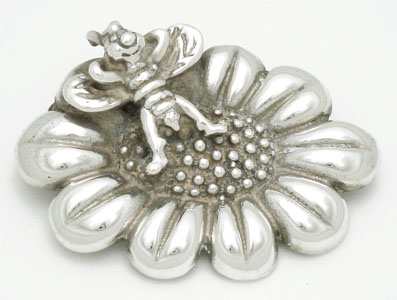 Brooch flower with bee leaned