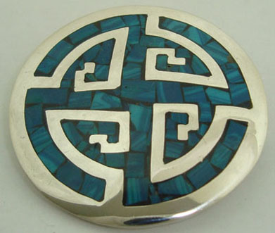 Round brooch with  border  of natural turquoise